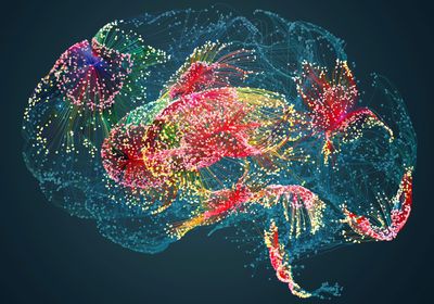 Digital illustration of a brain, constructed by tiny dots and lines. Most dots and lines are teal-colored; others are green, yellow, red, and purple to denote areas of activity.