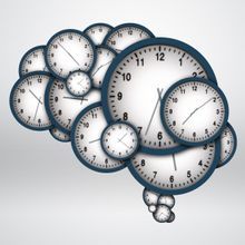 illustration of multiple clocks arranged in the shape of a brain
