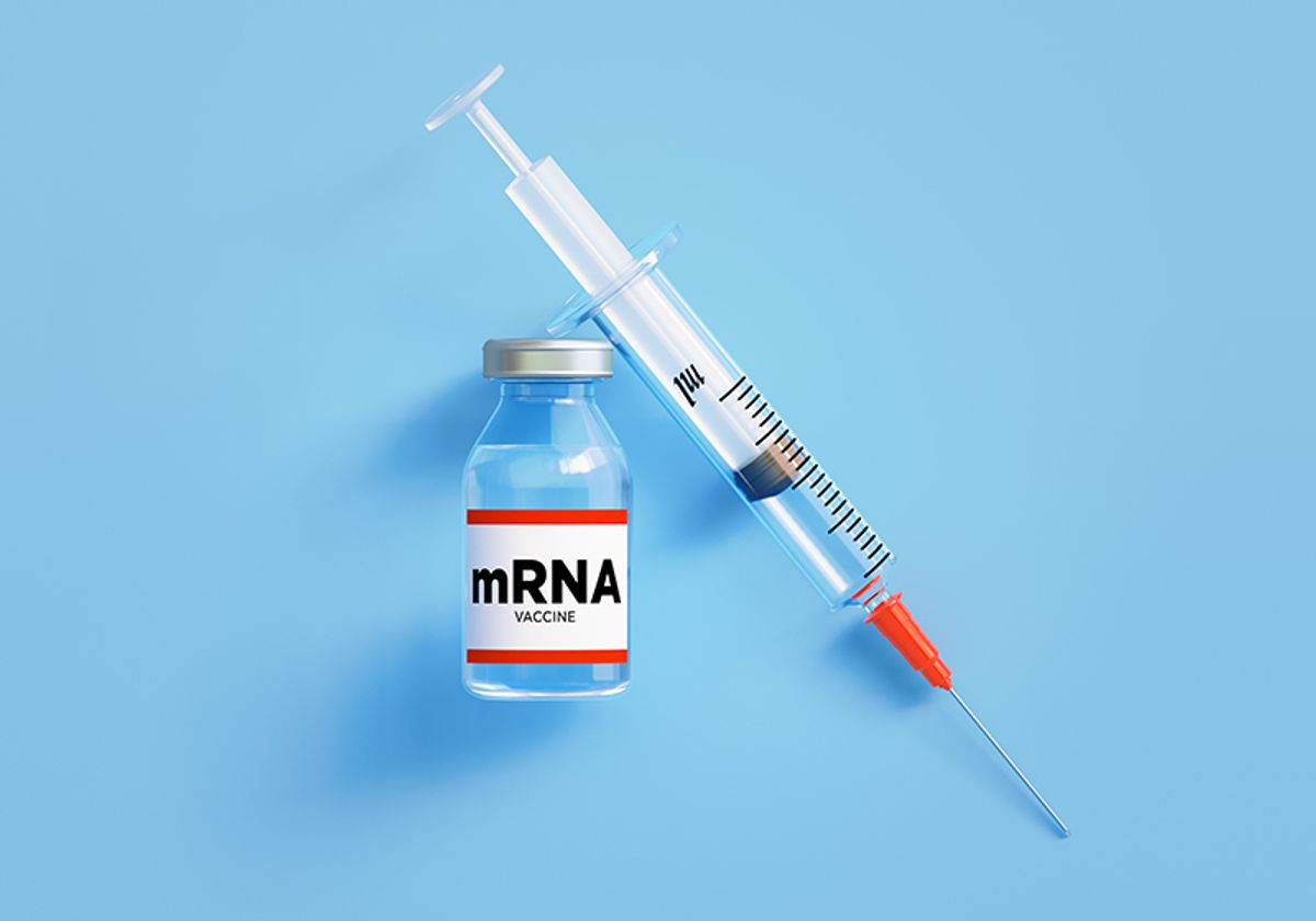A vial labeled “mRNA vaccine” and a syringe on a blue background.
