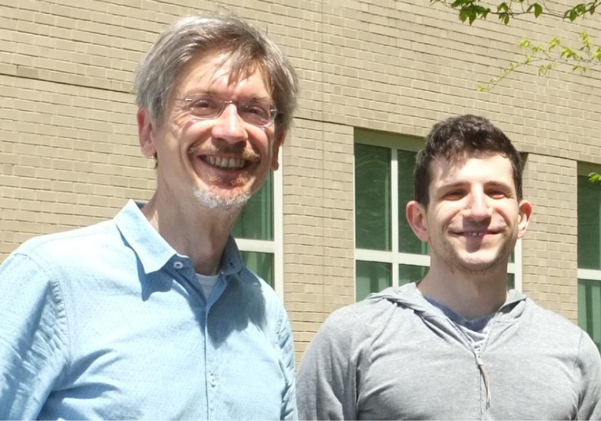 Thomas Biederer and Andrew Paquette from Yale School of Medicine standing in front of a building.